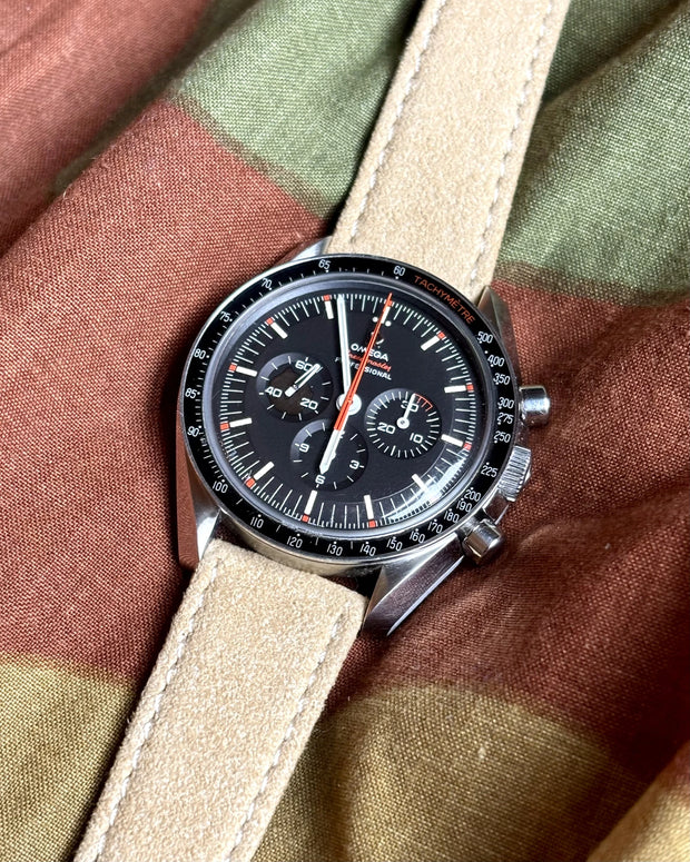 Alcantara® Travertine on Omega Speedmaster Ultraman – lifestyle view